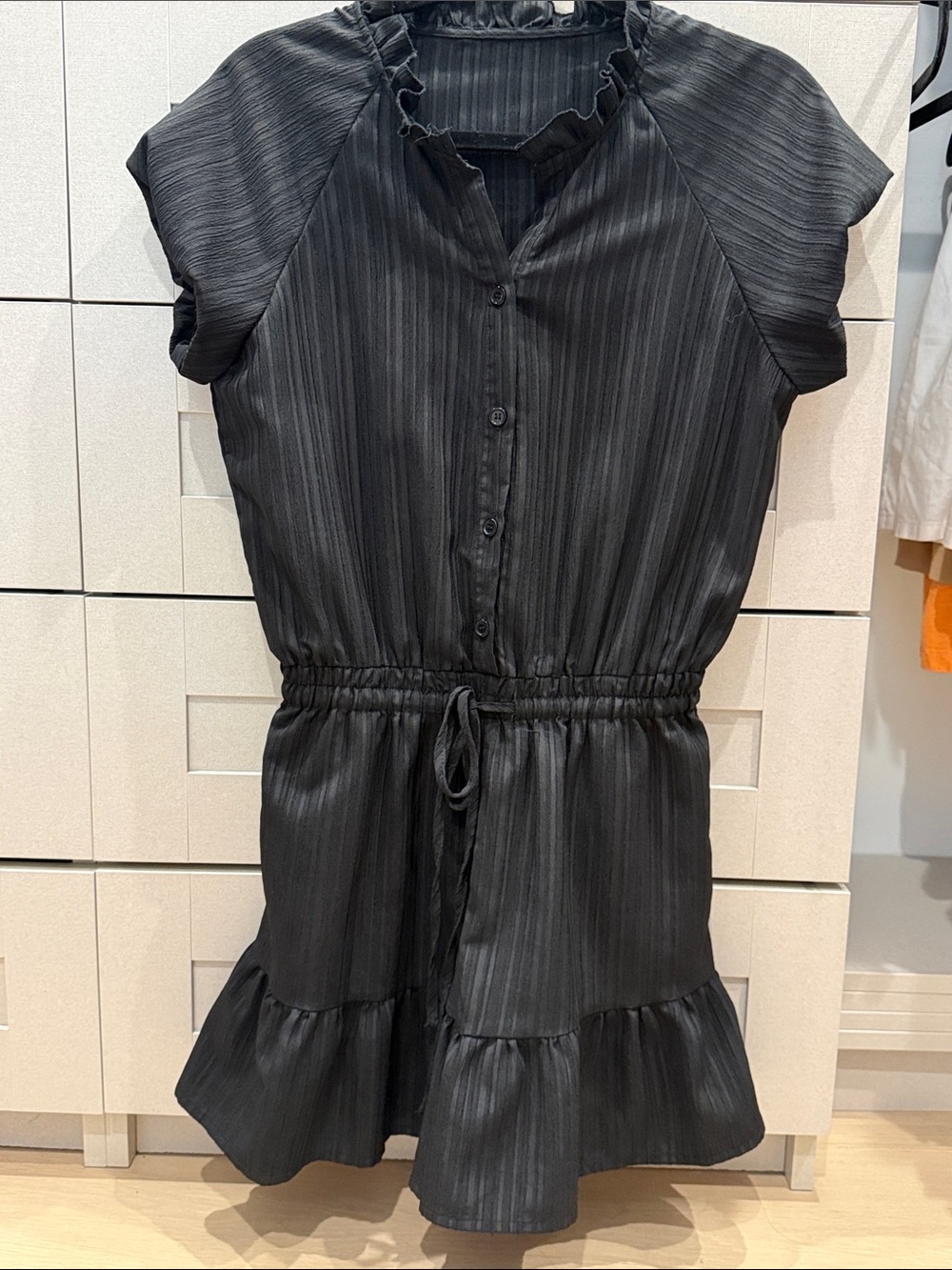 Black Ruffle Hem Button-Front Romper